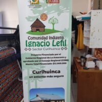 Banner de apoyo a la Comunidad Indígena Ignacio Lefil en Sector Curihuinca con financiamiento regional.